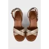 Leather sandals with metal flower