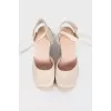 Beige wedge shoes