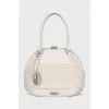 White bag made of leather and textile