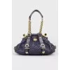 Texture bag with golden fittings