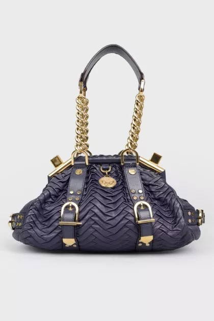 Texture bag with golden fittings