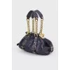 Texture bag with golden fittings