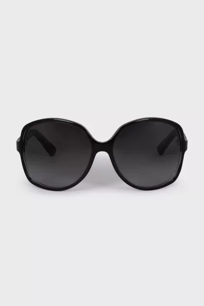 Black sunglasses with brand logo