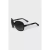 Black sunglasses with brand logo