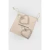 Clips in the shape of a heart with pearls