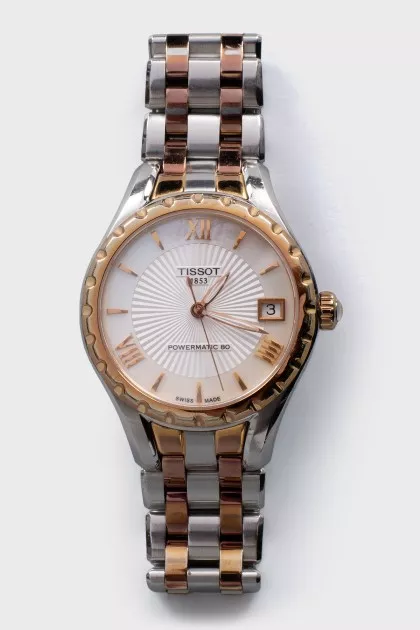 Watch with mother of pearl dial