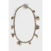 Metal belt with pendants