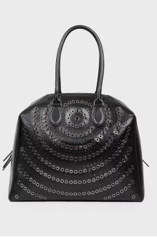 Bag with eyelets and perforations