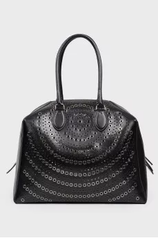 Bag with eyelets and perforations
