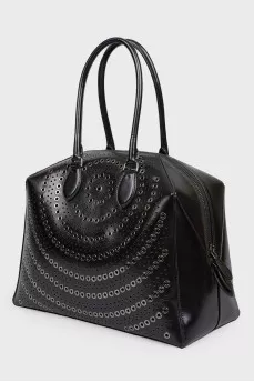 Bag with eyelets and perforations