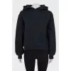 Black hoodie with print on sleeve