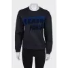 Black sweatshirt with embossed logo