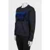 Black sweatshirt with embossed logo