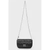 Black bag made of leather quilted