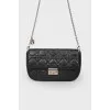 Black bag made of leather quilted