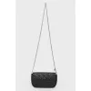 Black bag made of leather quilted