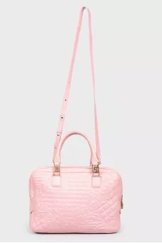 The bag is quilted with golden fittings