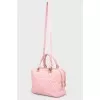 The bag is quilted with golden fittings