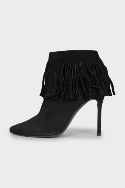 Black suede ankle boots with fringe