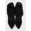 Black suede ankle boots with fringe