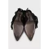 Black suede ankle boots with fringe