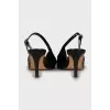 Patent leather slingbacks with golden bow