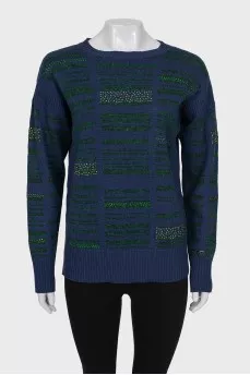 Cashmere sweater decorated with rhinestones