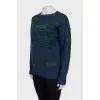 Cashmere sweater decorated with rhinestones