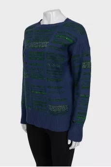 Cashmere sweater decorated with rhinestones