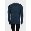 Cashmere sweater decorated with rhinestones