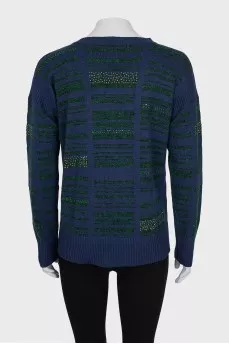 Cashmere sweater decorated with rhinestones