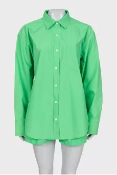 Green suit of shirt and shorts