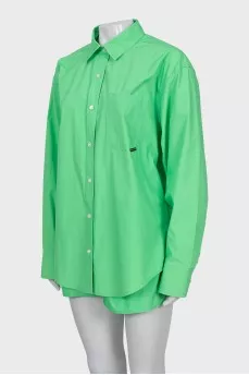 Green suit of shirt and shorts