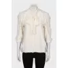 Loose fit blouse with tie