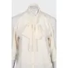 Loose fit blouse with tie