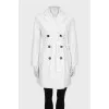 Cropped white double-breasted trench coat