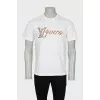 Men's white t-shirt decorated with rhinestones