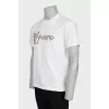 Men's white t-shirt decorated with rhinestones