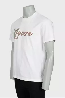 Men's white t-shirt decorated with rhinestones