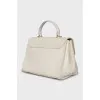 White ostrich leather bag