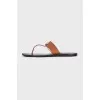 Brown flip flops with logo