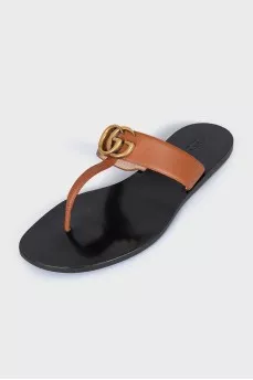 Brown flip flops with logo