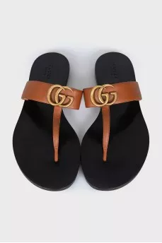 Brown flip flops with logo
