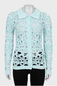 Cardigan with perforated buttons
