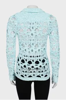Cardigan with perforated buttons