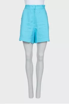 Blue shorts with gold buttons