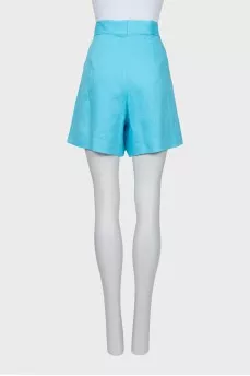 Blue shorts with gold buttons