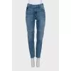 Jeans with raw edges and distressing