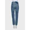 Jeans with raw edges and distressing