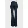 Blue low rise flared jeans